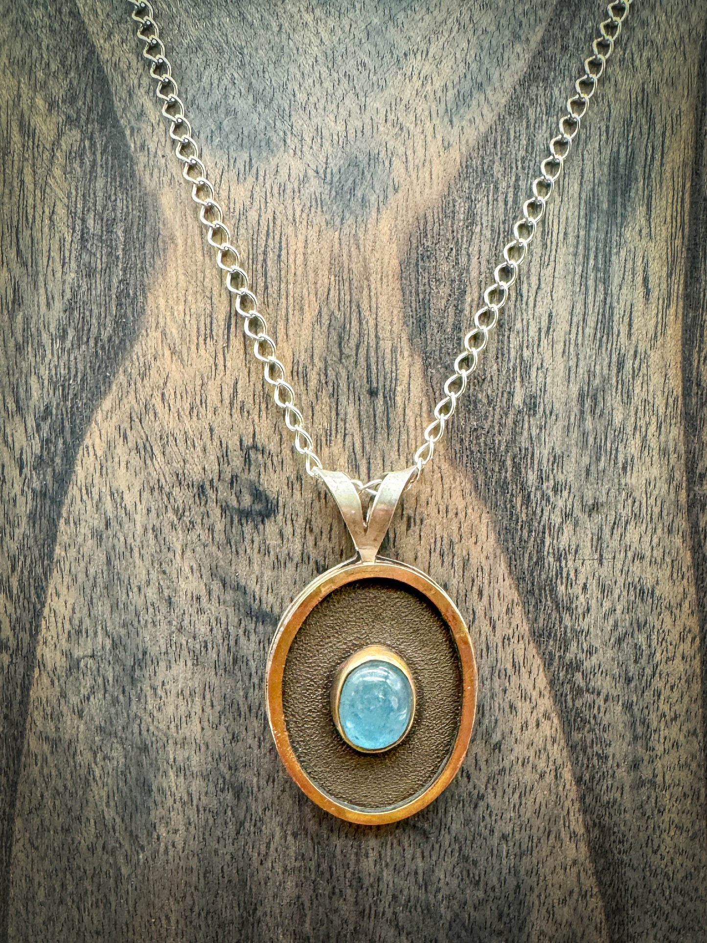 Aquamarine golden pendant